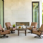 Harbour Swivel Rocker Lounge Chairs around an Oceanside Occasional Table